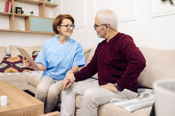 istock Senior man is having a health checkup at home 1319227947