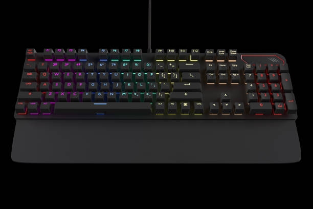 istock Black computer keyboard with rgb color isolated on black with clipping path. 1319228093