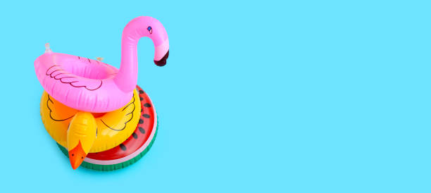 istock Inflatable rings on blue background. Summer background concept 1319229374