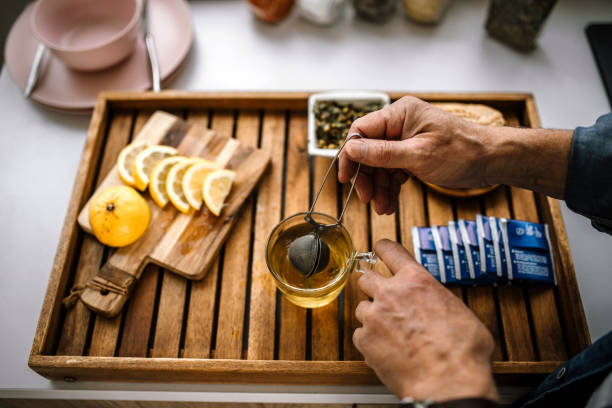 istock Mature man preparing homemade herbal tea 1319230240