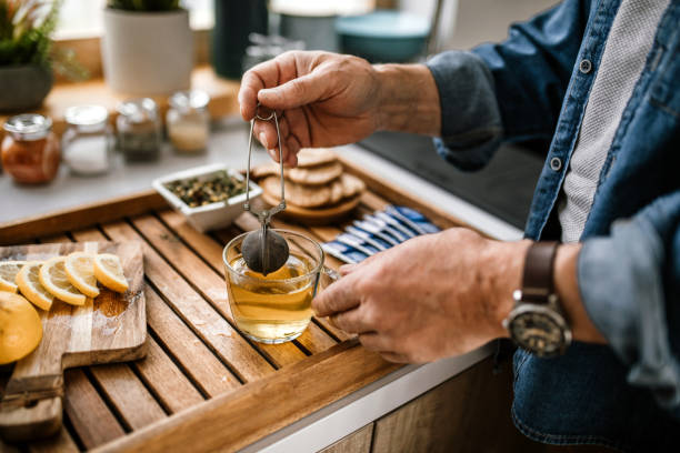 istock Mature man preparing homemade herbal tea 1319230330