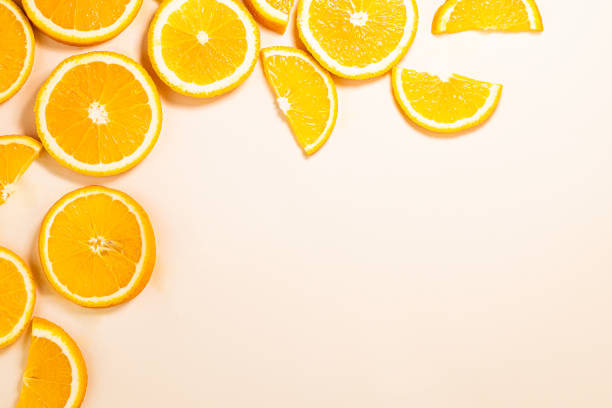 istock pattern of sliced orange background. Orange fruit top view with copy space. 1319230578