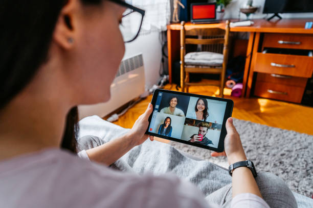 istock Woman having a video call with friends 1319231095