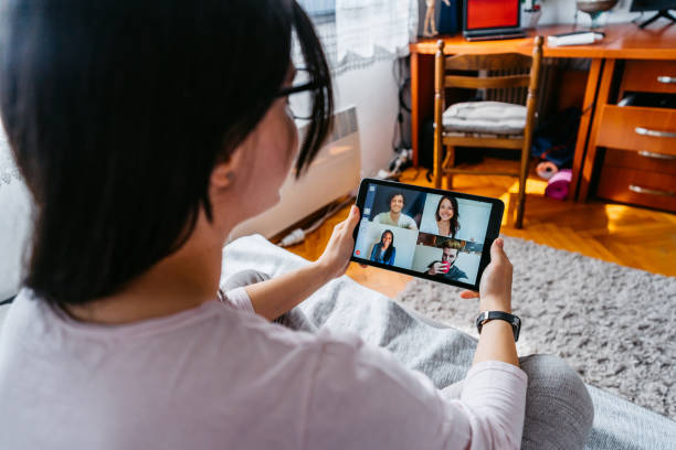 istock Woman having a video call with friends 1319231223