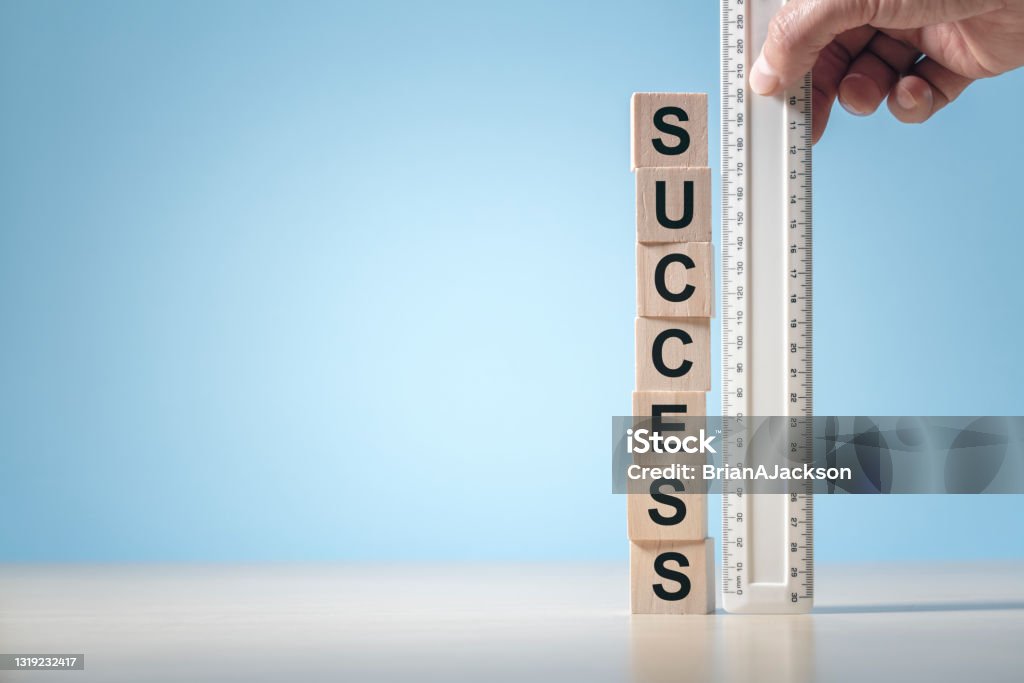 Measuring success background with copy space Measure success background ruler measuring wood block with word success and copy space Success Stock Photo