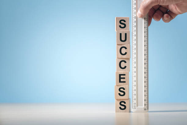Measuring success background with copy space Measure success background ruler measuring wood block with word success and copy space performance assessment stock pictures, royalty-free photos & images