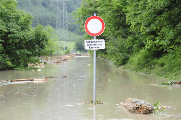 a flooded road after heavy rainfall and thunderstorms took place