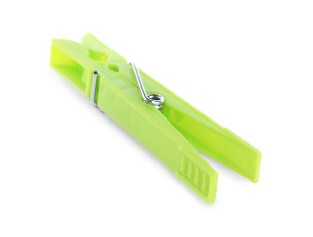 istock Bright green plastic clothespin isolated on white 1319233268