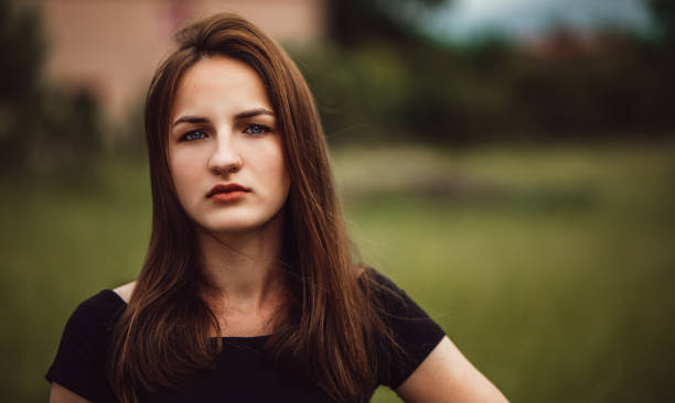 istock Beautiful woman on meadow 1319233344