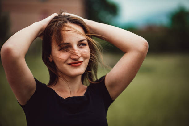 istock Beautiful woman on meadow 1319233396