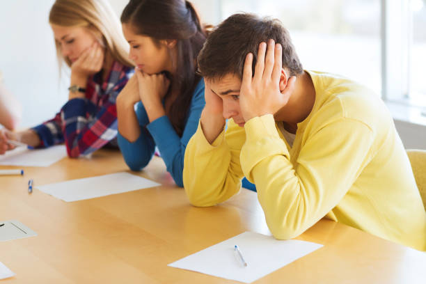 istock group of students with papers 1319233458