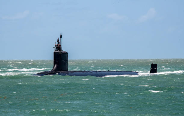 submarine A Virginia Class US nuclear powered, fast-attack submarine, on the surface at sea. It is used for intelligence gathering and anti-submarine warfare using the latest stealth, intelligence gathering, and weapons technology. Weapons include torpedoes and cruise missiles.
Off Port Canaveral, Florida
05/20/2021 immersed in their work stock pictures, royalty-free photos & images