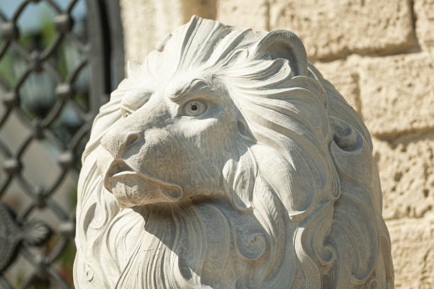 istock Statue Of Lion Old Architecture 1319240036
