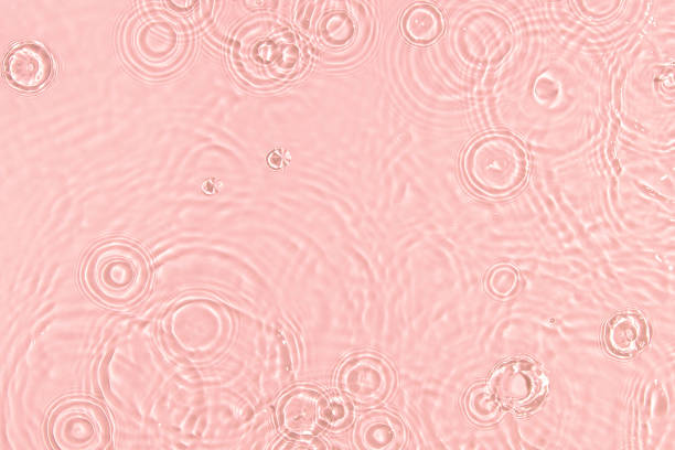 istock pink transparent clear water surface texture summer background 1319244965