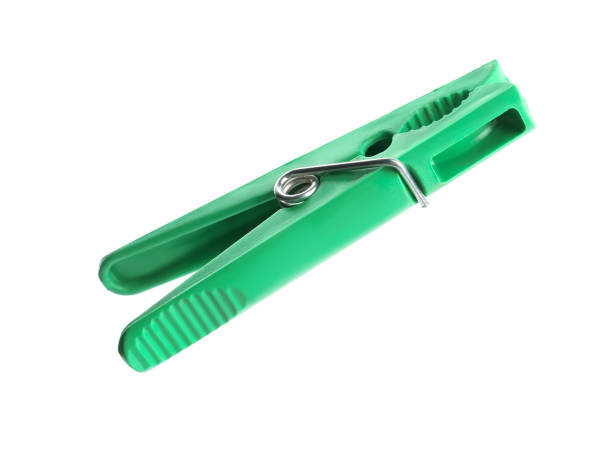 istock Bright green plastic clothespin isolated on white 1319246234