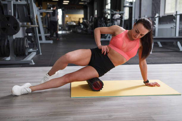 istock Sportswoman exercising at gym 1319250366