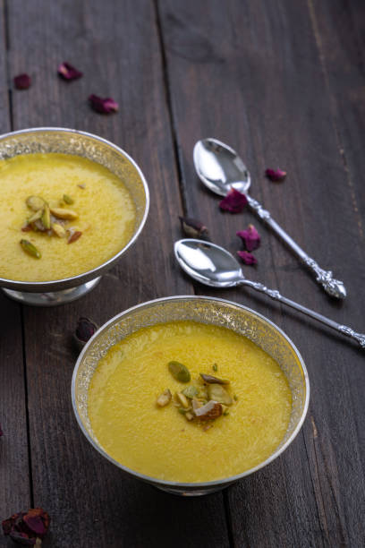 istock mango-flavored Phirni served in metal bowls 1319251392