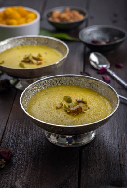 istock mango-flavored Phirni served in metal bowls 1319251503