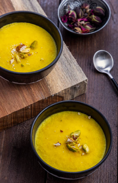 istock mango-flavored Phirni served in metal bowls 1319251673