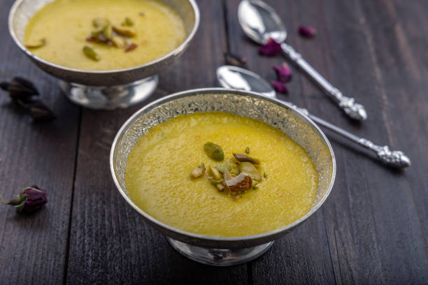 istock mango-flavored Phirni served in metal bowls 1319251727