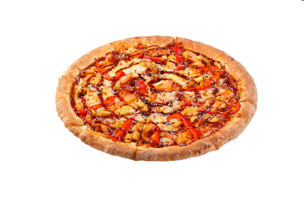 istock Side view on BBQ Chicken pizza with tomatoes and paprika 1319251764