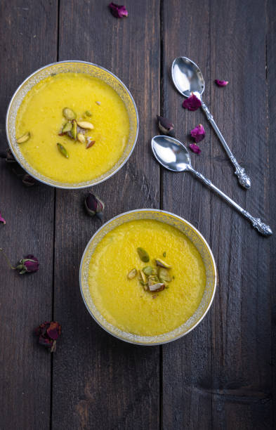 istock mango-flavored Phirni served in metal bowls 1319252288