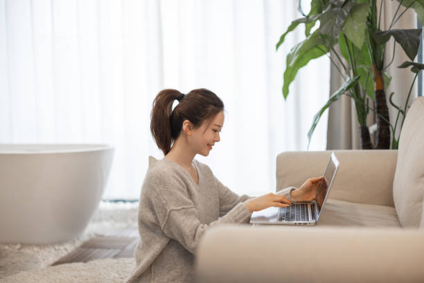 istock Young Asian women working at home 1319252357