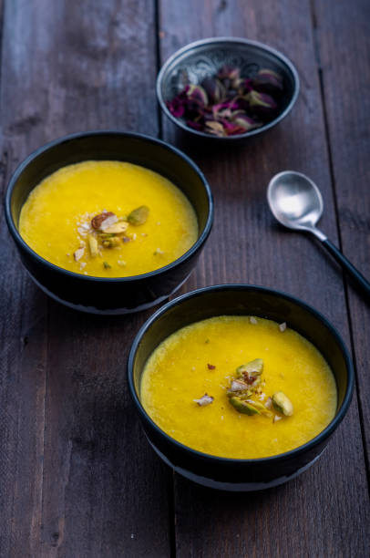 istock mango-flavored Phirni served in metal bowls 1319252676