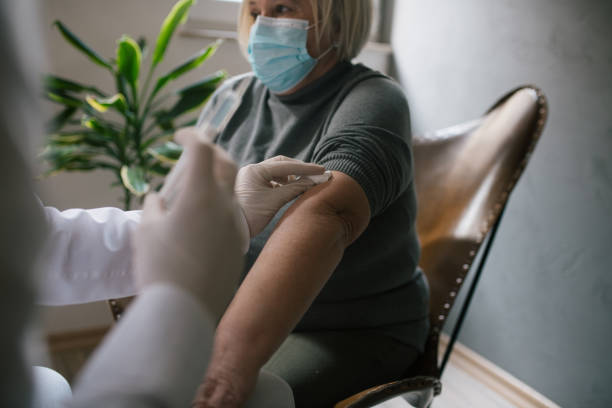 istock Arm disinfection due to vaccination 1319252763