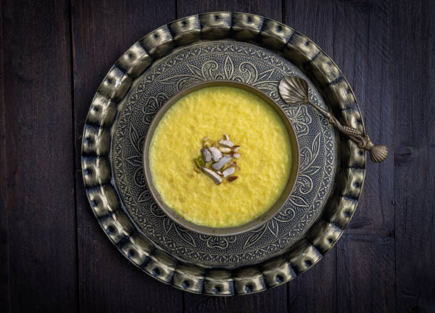 istock mango-flavored Phirni served in metal antique plates 1319252833