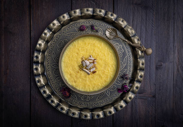 mango-flavored Phirni served in metal antique plates