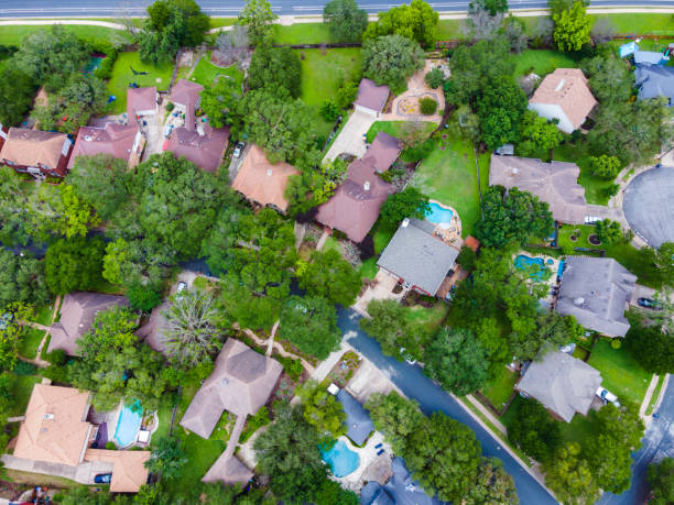 istock Straight down drone angle above Luxury Suburb Homes in South Austin Texas Hill Country 1319254792