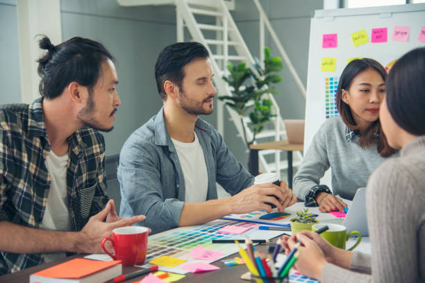 istock Creative design office center working teamwork. Happy business people partner plan strategy organization research people together at diversity office using laptop, smartphone company conference room 1319262374
