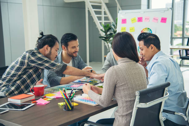istock Creative design office center working teamwork. Happy business people partner plan strategy organization research people together at diversity office using laptop, smartphone company conference room 1319262375