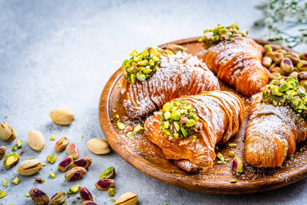 istock Typical italian sweet food sfogliatelle on gray background 1319266498