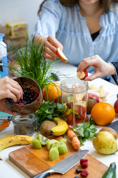 istock Close-up of peparing helahty fruit smoothie 1319276549