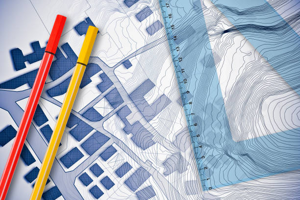 istock Plastic set square with red and yellow marking pen over an imaginary cadastral map of territory with buildings, fields and roads - 3D rendering concept image 1319277529