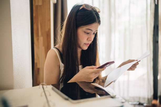 istock Multitasking of young female entrepreneur. 1319282659