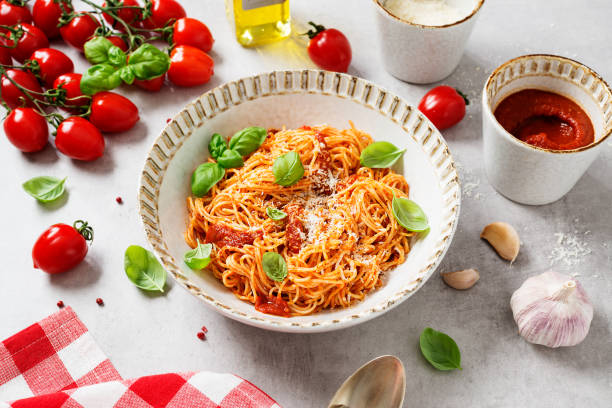 istock Classic italian spaghetti pasta with tomato sauce 1319284037