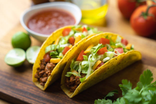 istock hard shell taco on wooden board with lime 1319285685