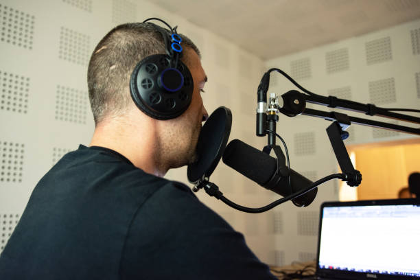istock Handsome male radio host in studio 1319286132