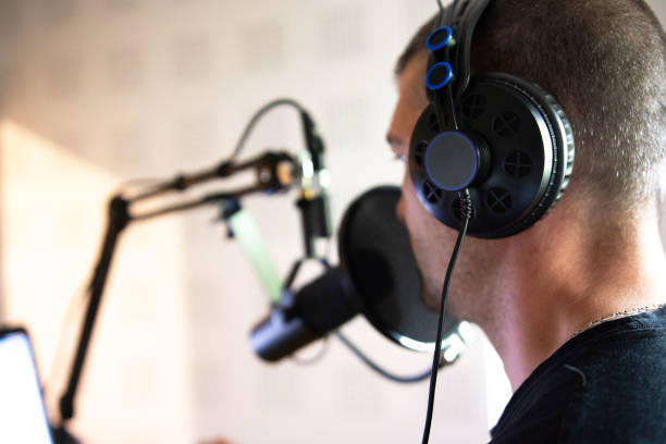 istock Handsome male radio host in studio 1319286926