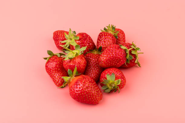 istock Strawberries on pink background. Creative food concept. Flat lay, top view, copy space 1319286977