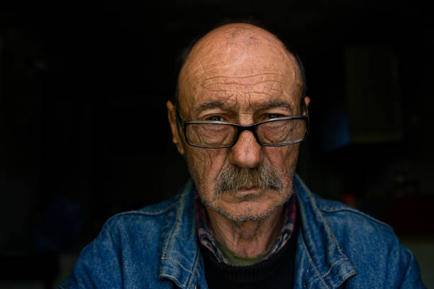 istock Lonely man wearing a denim jacket 1319293200