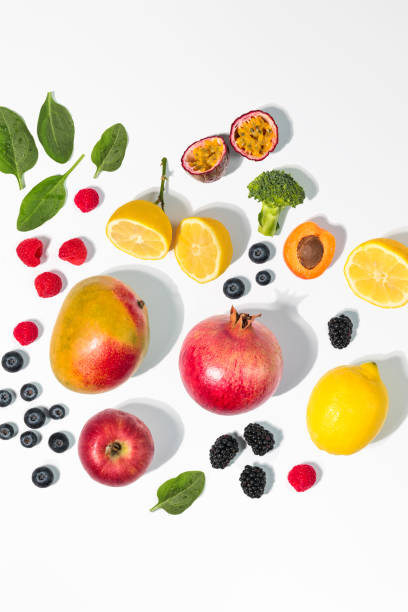 fresh fruits and vegetables with vitamin antioxidants on white background - antioxidant imagens e fotografias de stock