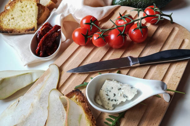 istock lunch of rye bread, blue cheese and cherry tomatoes 1319299140