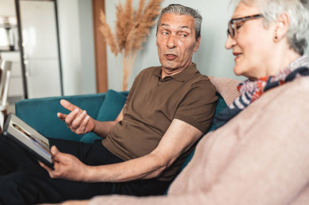 istock An elderly couple has a video call with their doctor 1319299582