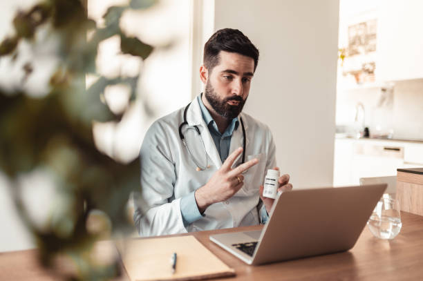 istock Doctor explaining his patient about new medicament 1319301091