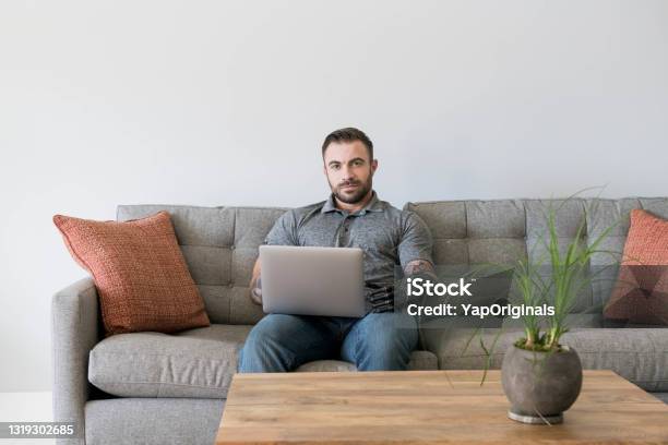 Handicapped Man With Laptop Stock Photo - Download Image Now - Amputee, Domestic Life, Artificial Limb