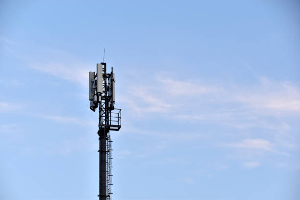 istock Antenna transmitter on an iron mast in the city 1319314521